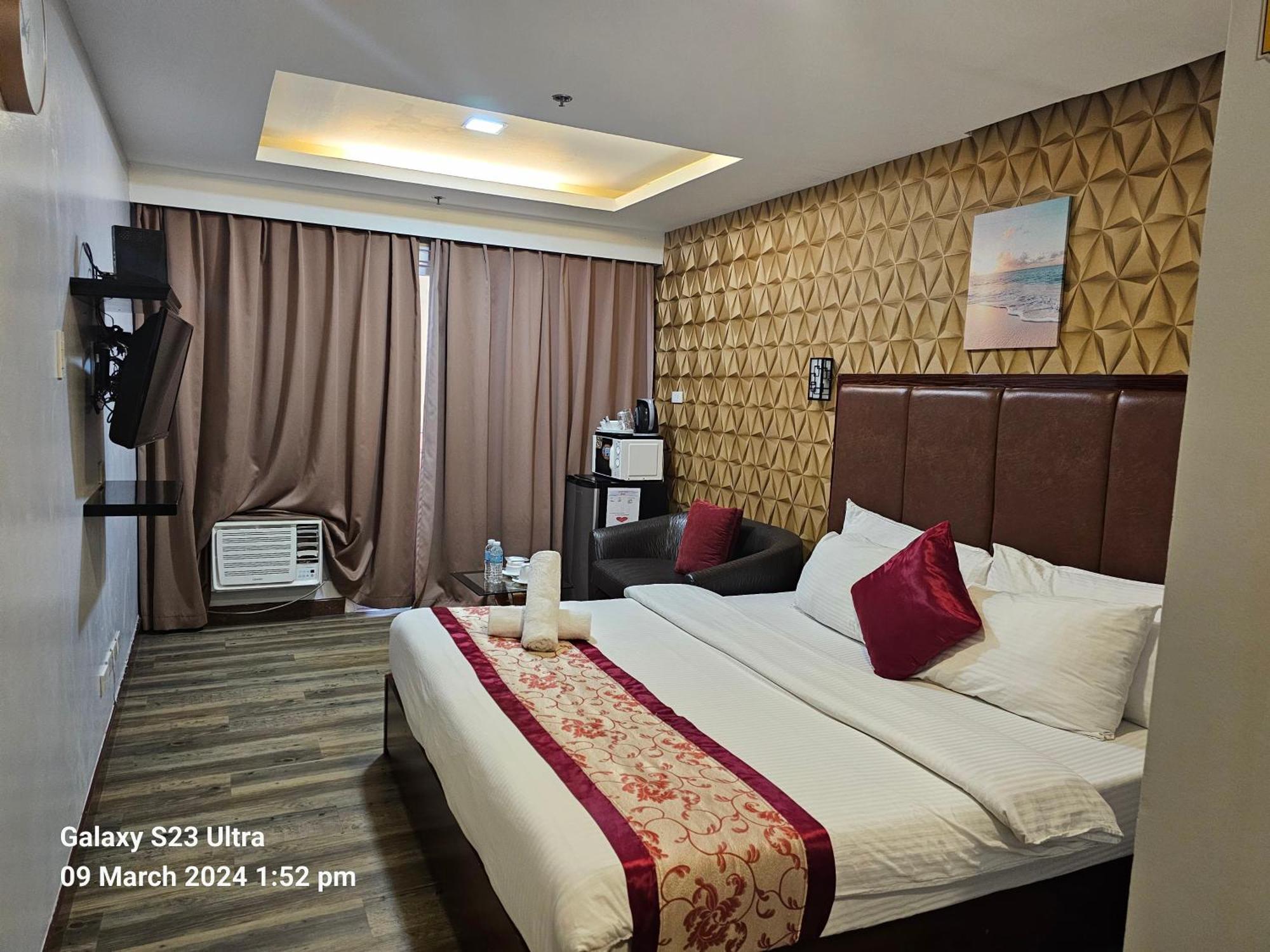 Jmm Grand Suites Манила Экстерьер фото